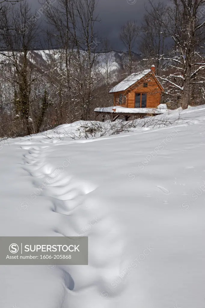 France, Ariege, Pyrenees, wooden chalet in winter