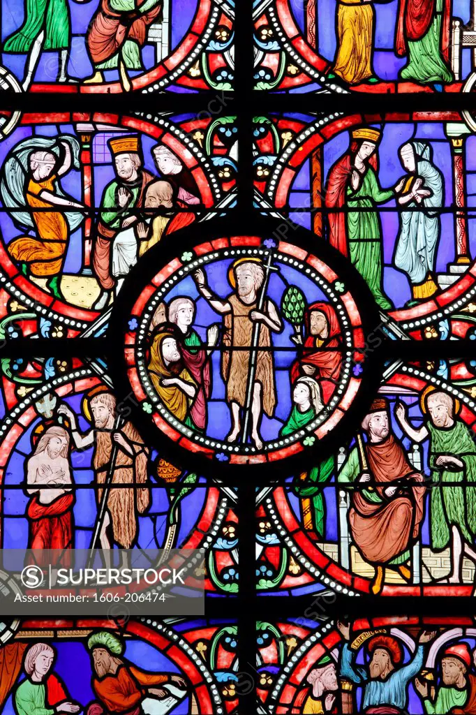 Stained glass in Notre Dame de Coutances cathedral depicting scenes from Saint John the Baptist's life Coutance. France.