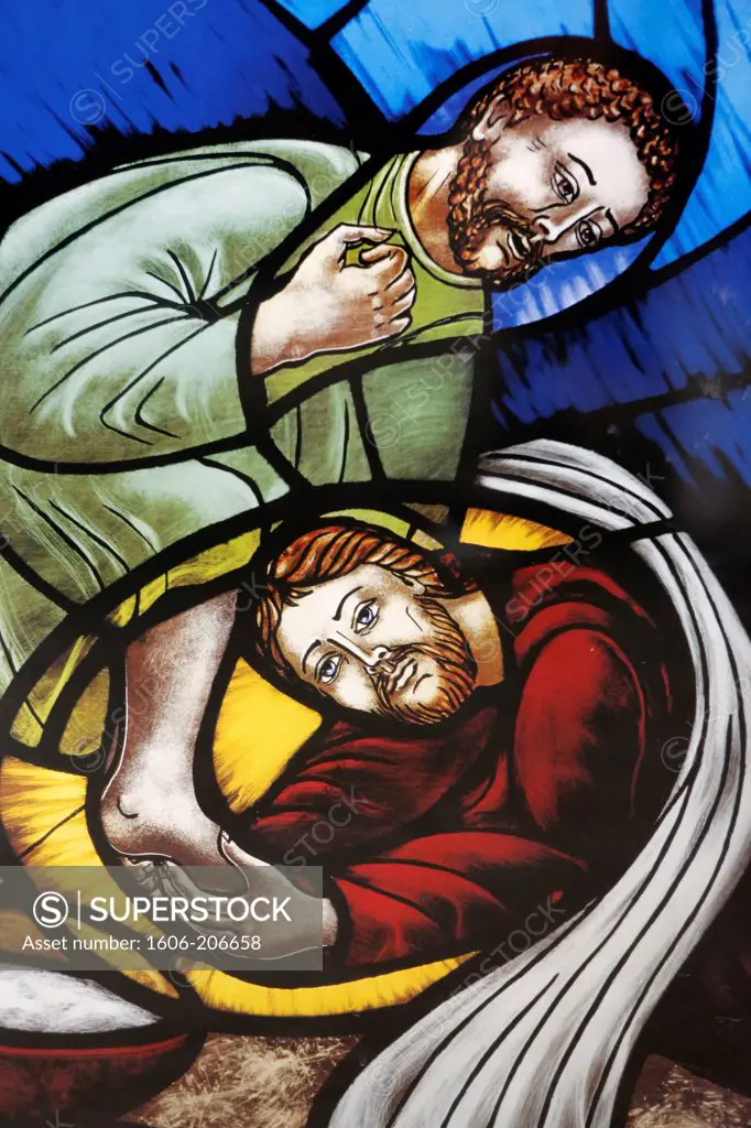 Stained glass in Santa Croce church : Jesus washing a disciple's feet Lecce. Italy.