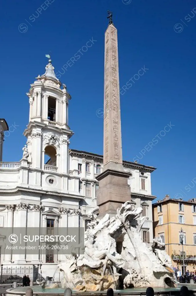 Italy. Rome. Piazza Navona. Obelisk Fountain of the Four Rivers and church of Sant Agnese in Agone Borromini.
