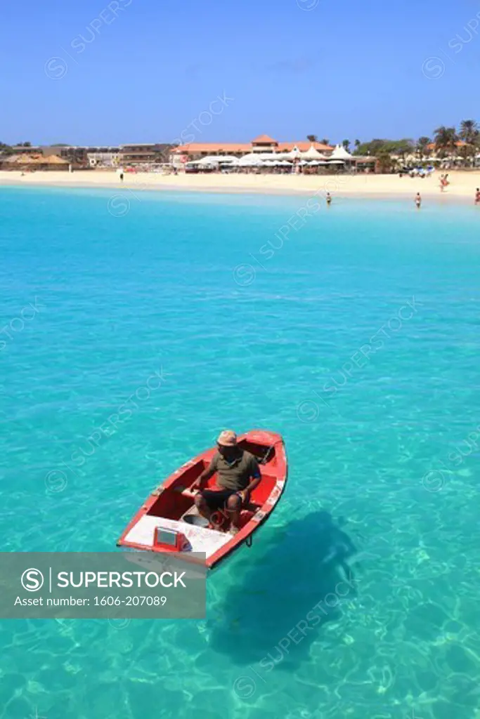 Western Africa,Republic of Cape Verde, Sal island. Santa Maria. Boat on clear water.