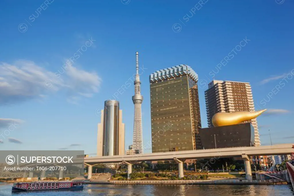 Japan,Honshu,Kanto,Tokyo,Asakusa,Office Buildings and Skytree Tower and Sumidagawa River