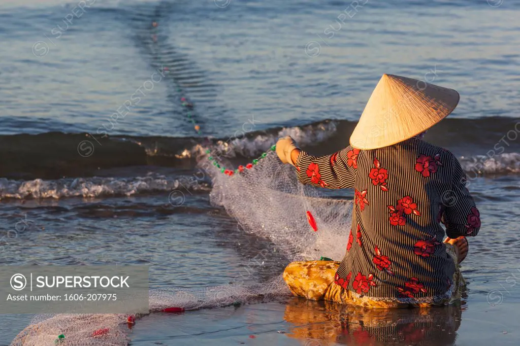 Vietnam,Mui Ne,Mui Ne Beach,Net Fisherwoman