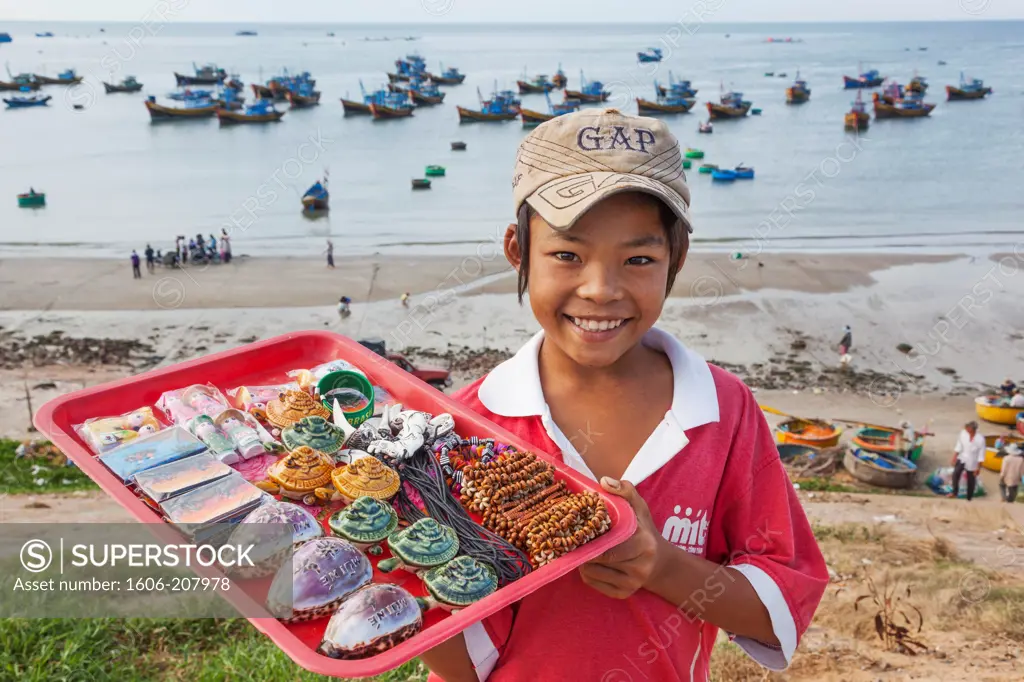 Vietnam,Mui Ne,Mui Ne Beach,Young Child Selling Souvenir Seashells