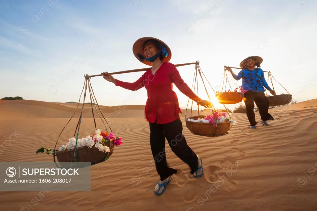 Vietnam,Mui Ne,Sand Dunes and Local Women in Conical Hats