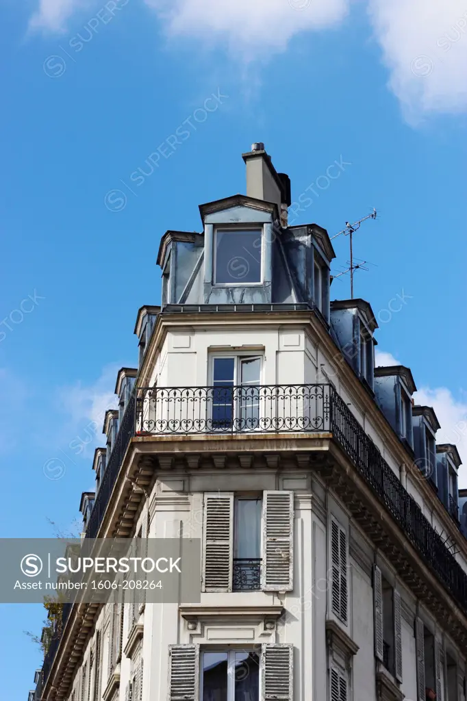 FRANCE, Paris, corner building, blue sky
