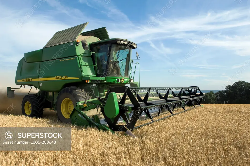 France, combine harvester in a wheatfield