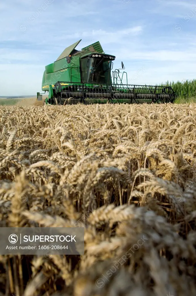 France, combine harvester in a wheatfield