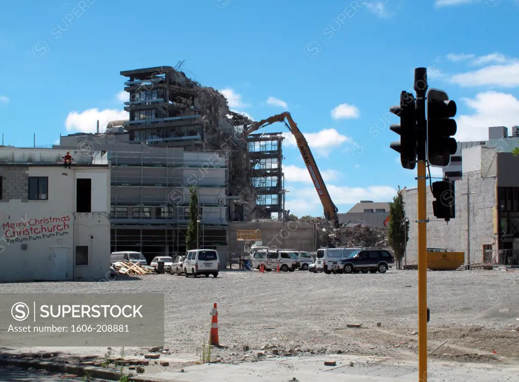 NEW ZEALAND South ISLAND Canterbury region some buildings damaged by the earthquake are destroyed by a crane in the center of Christchurch destroyed