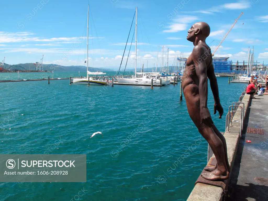 NEW ZEALAND NORTH ISLAND Wellington bronze sculpture of a bent man on the harbour