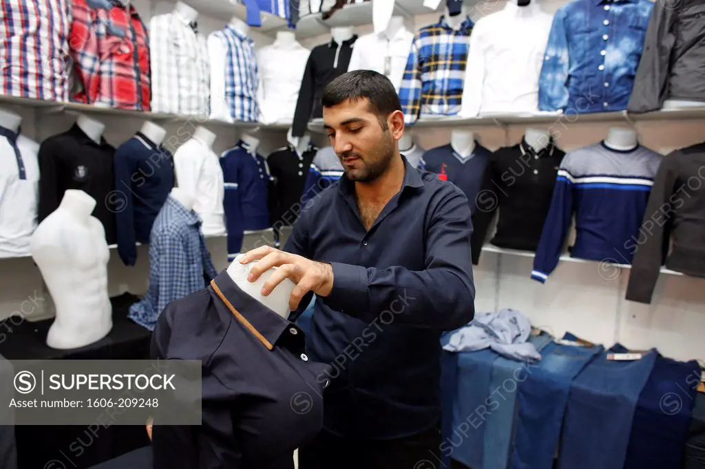 Natiq Ismaylov owns and runs a clothes shop financed with a US$3,500 loan from FINDEV Finance for Development (second loan, 18 months reimbursement). Azerbaijan.