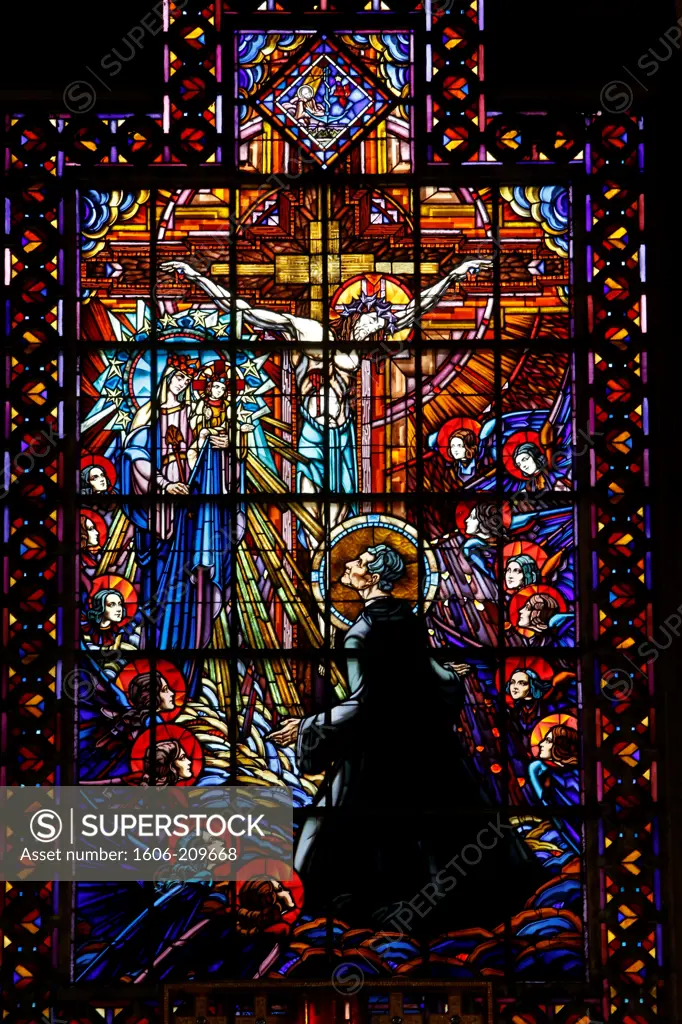 Stained glass in Saint John Bosco's church, Paris : Apothéose de saint Jean Bosco reçu au ciel par Marie, verrière par Antoine Bessac France.