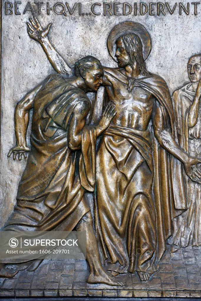 The Appearance to Thomas. The Holy door of St. Peter's Basilica. Cast in bronze by Vico Consorti (1949). Rome. Italy.