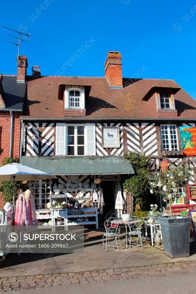 France, Normandy, Beuvron en Auge, downtown antique shop.
