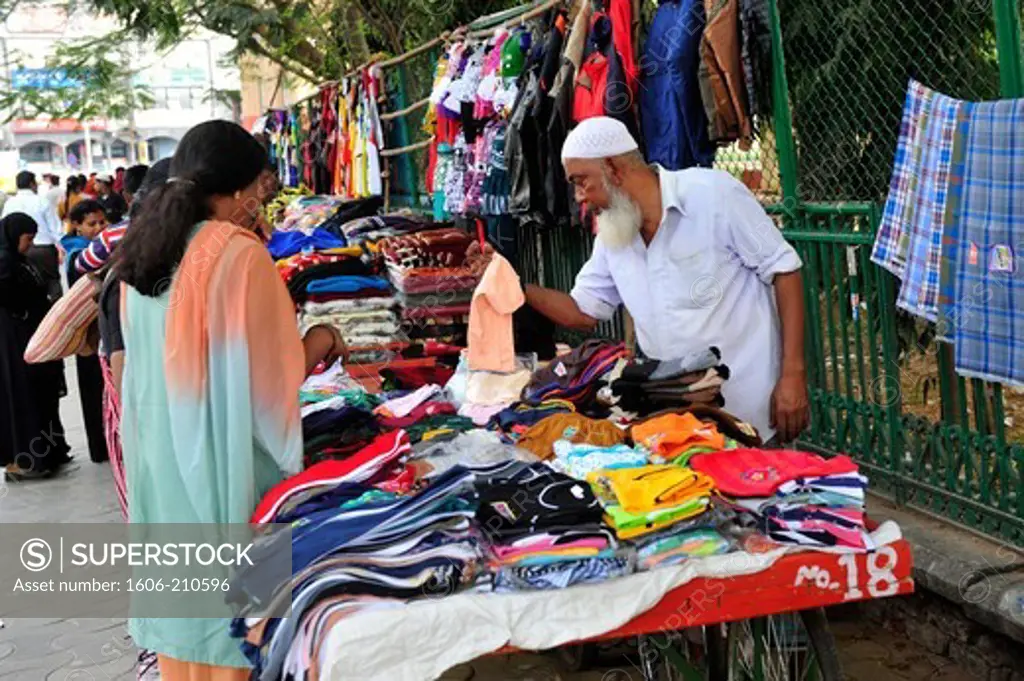A street vendor of clothes in market of Mysore,Karnataka state,South India,Asia