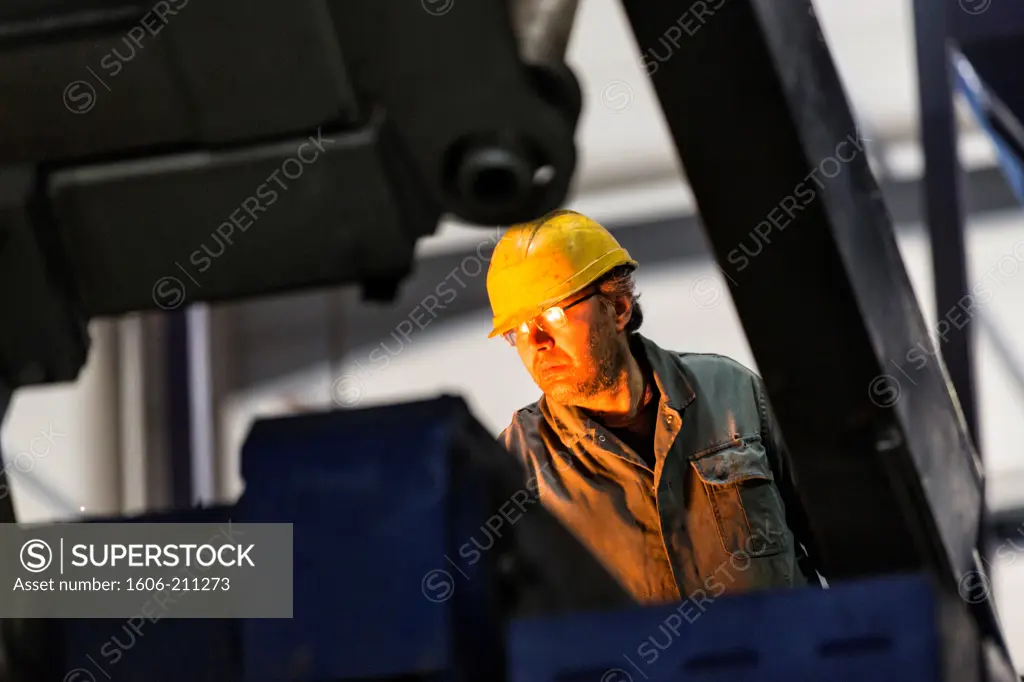 France, Centre, Dreux, Loiselet foundry, worker on production line.