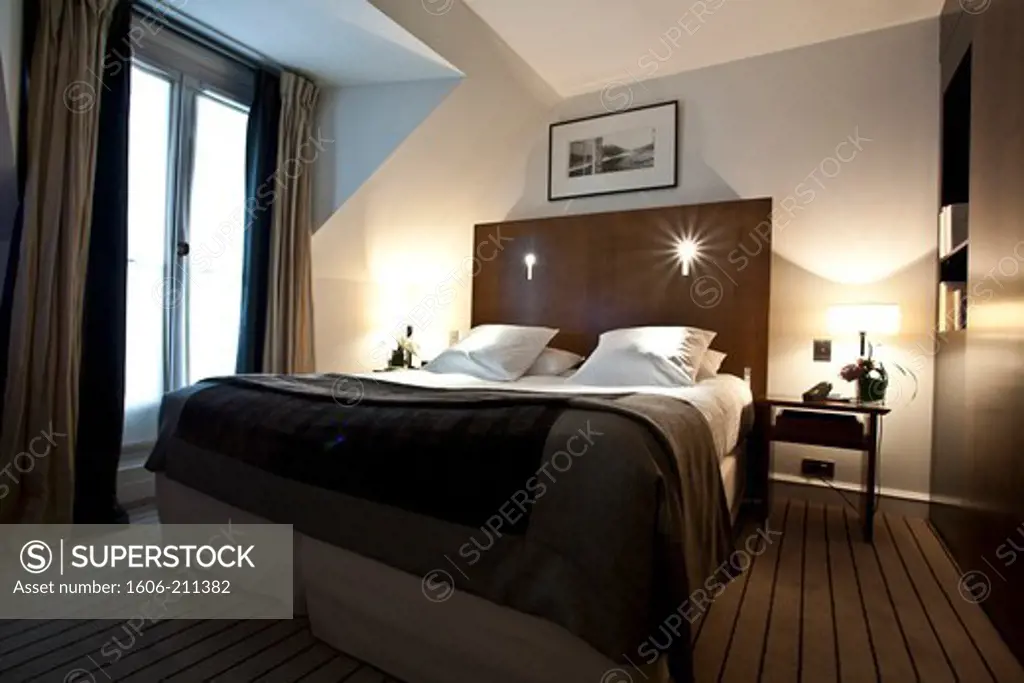 France, Paris, Montalembert Hotel, bedroom,bedside table, window.