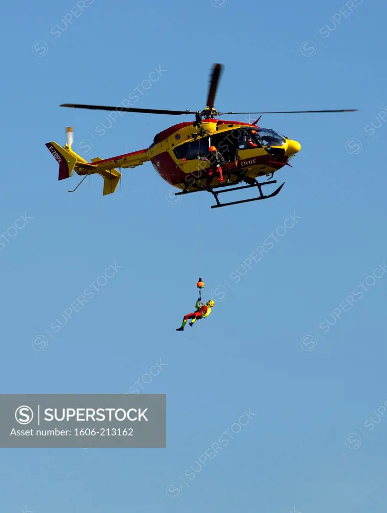 France, Paris, helicopter hoist training above river Seine.