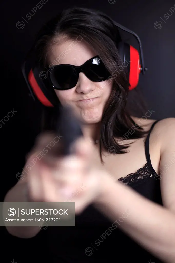 France, young woman with a gun.