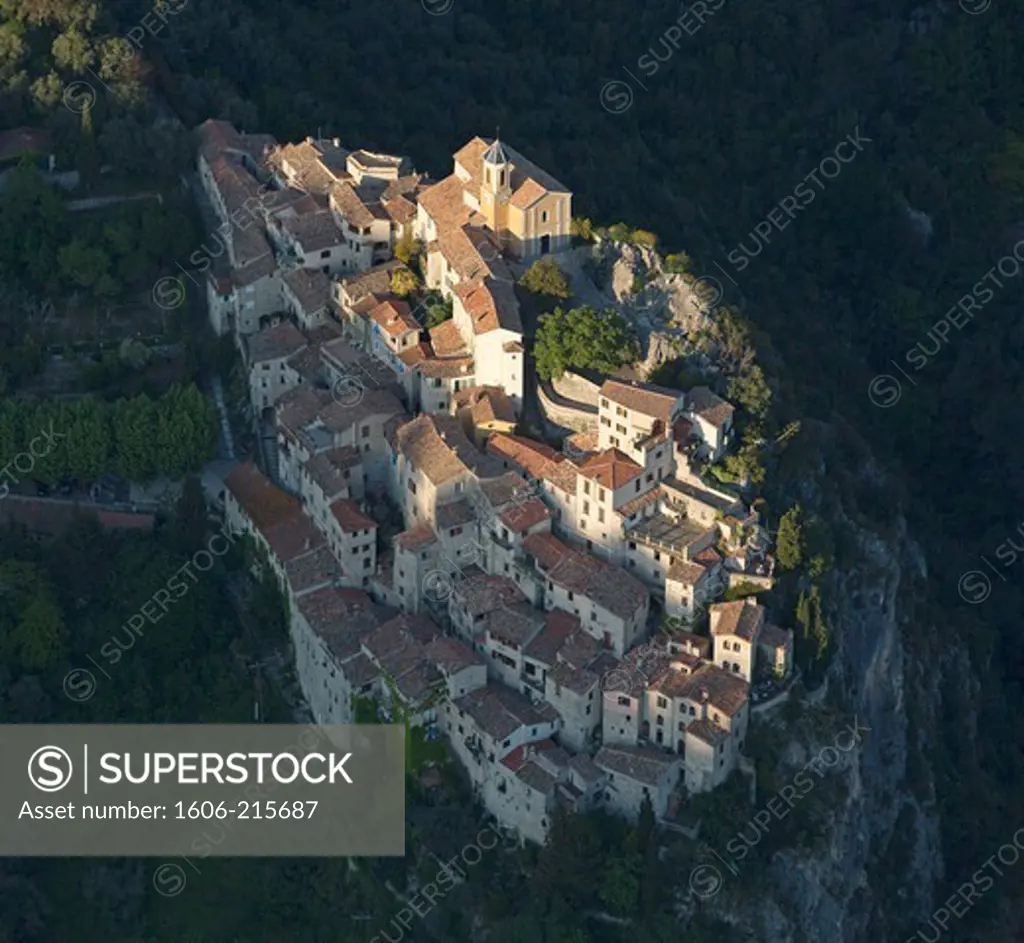 France, Alpes-Maritimes, Peillon, medieval perched village on a rocky spur surrounded by a steep ravine, aerial view
