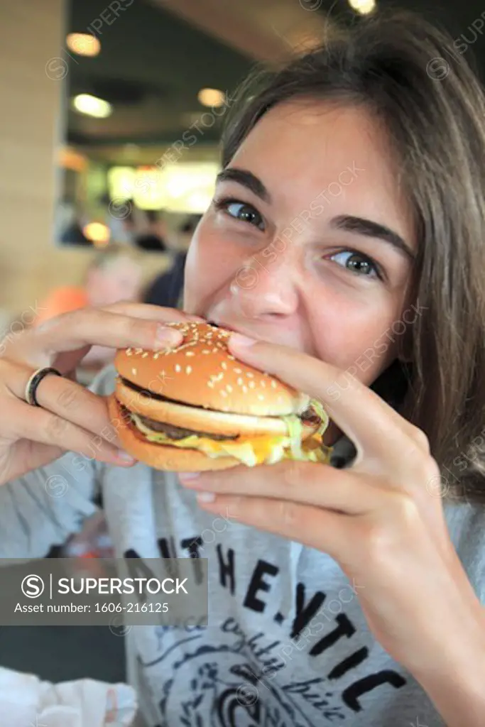 France, young girl in a fast-food.