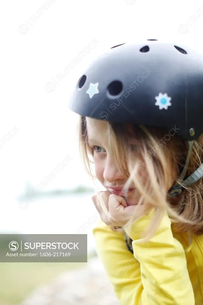 Portrait of a girl wearing a helmet