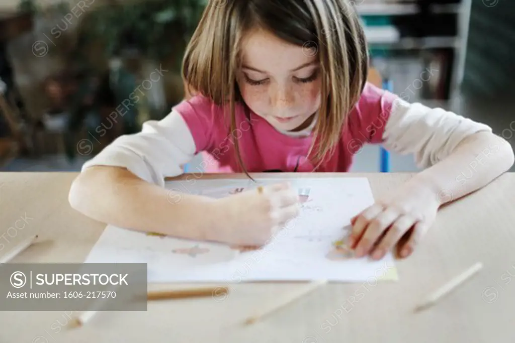 A little girl drawing