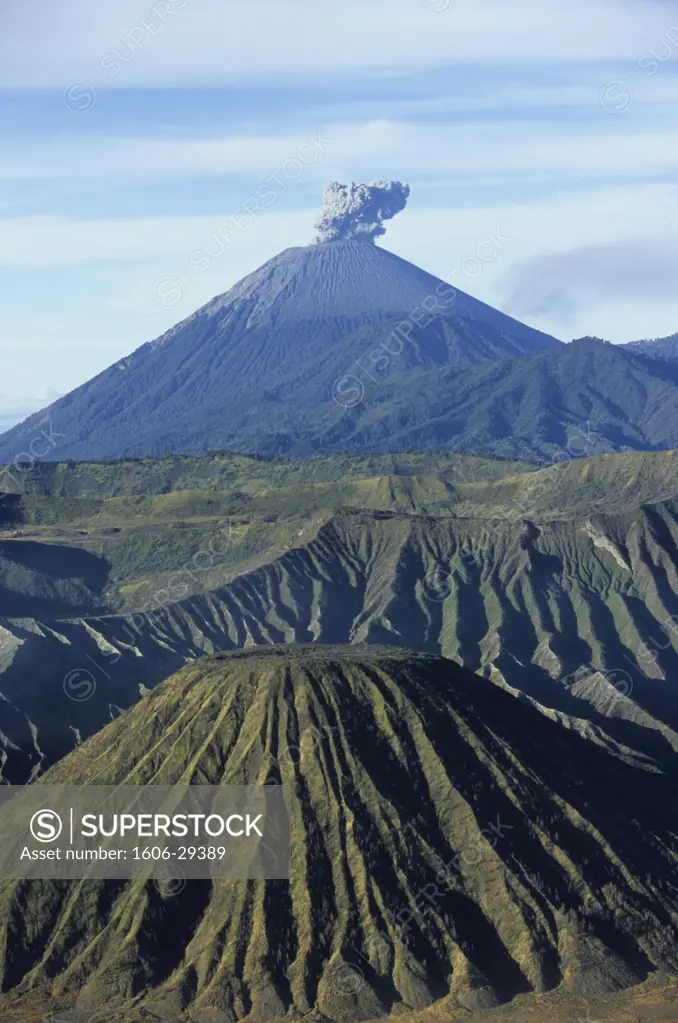 Indonesia, Java, Mount Bromo and Tengger caldeira, Semeru volcano erupting in the background