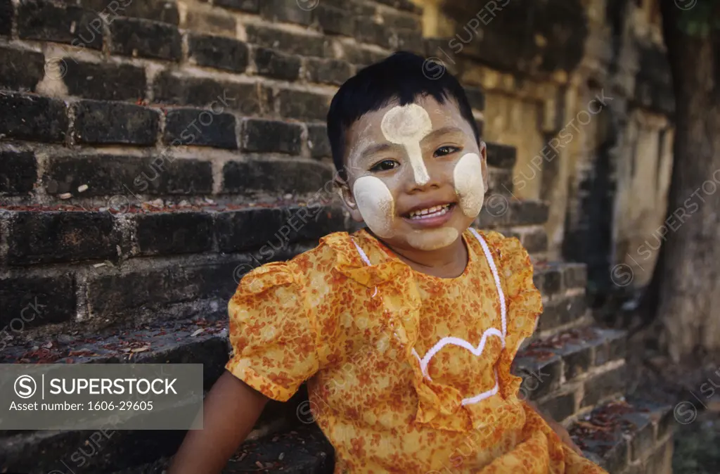 Burma, Bagan, portrait little girl with tanaka powder on her face