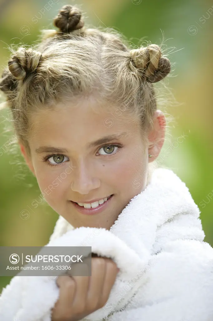 Portrait teenage girl smiling, white towel on her neck