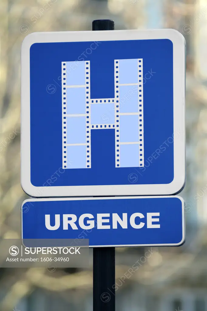Close-up on "hospital" roadsign with film-made H, "urgences" inscription (emergency)