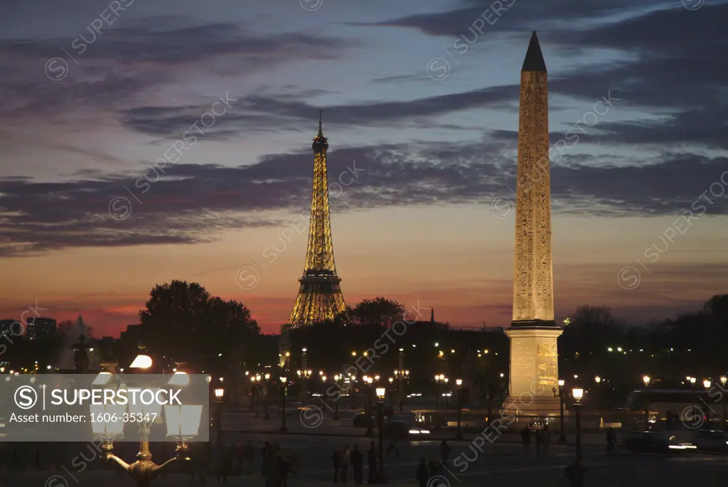 France, Paris, obelisk on Place de la Concorde and Eiffel Tower in the background, sunset
