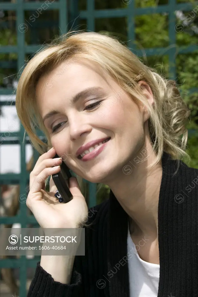 Portrait smiling woman posing, phoning