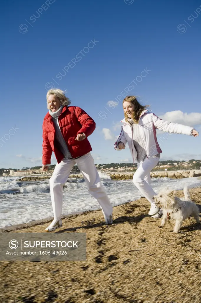 Matureand young women on a beach