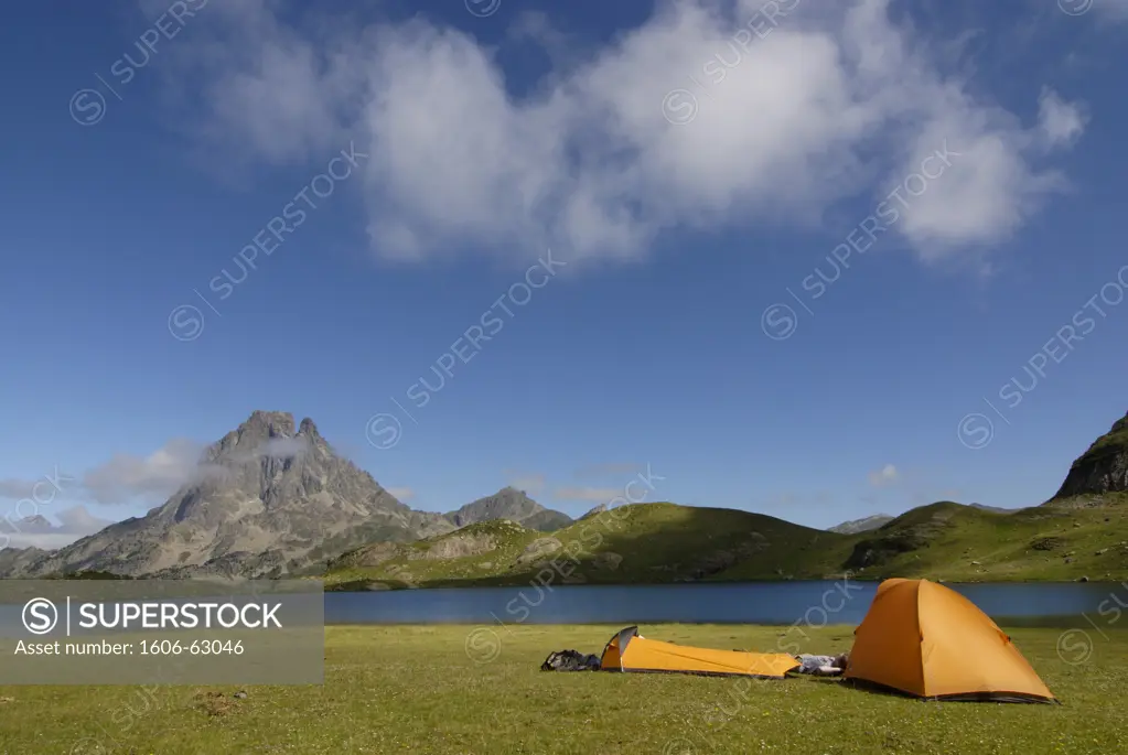France, Aquitaine, Pyrénées-Atlantiques, Ayous lake and pic du Midi d'Ossau, tents in the foreground