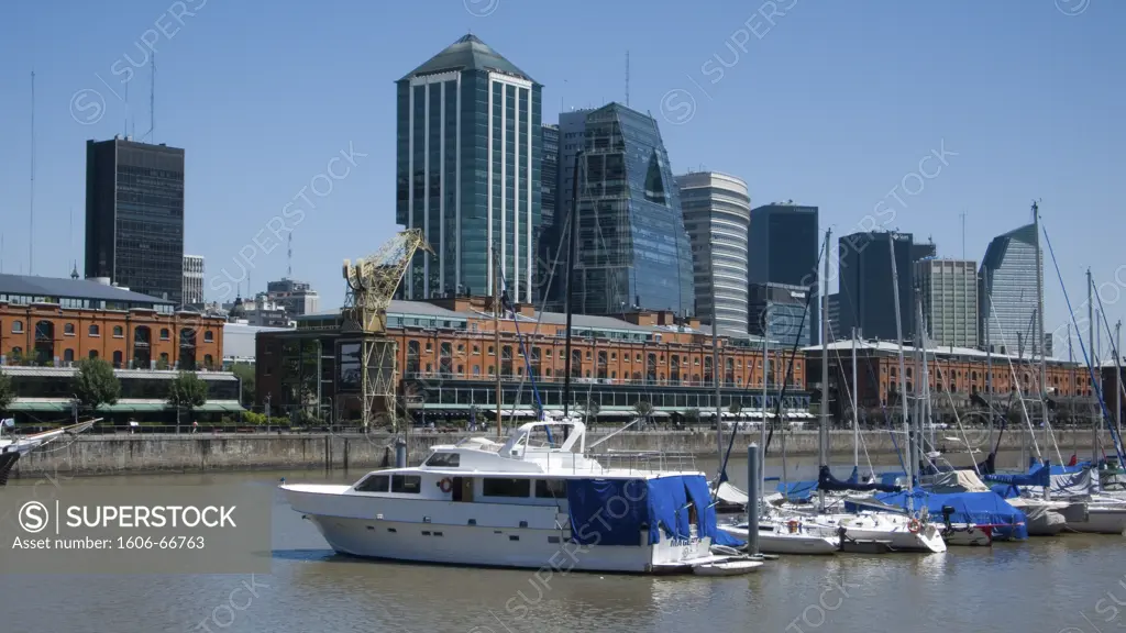 Buenos Aires, Puerto-Madero, building, quarter, business, blue sky, masts. Glassy modern towers of the business area..