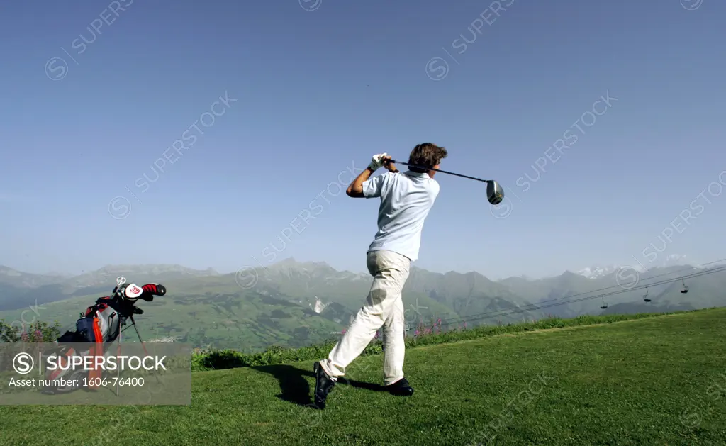France, Alps, Savoie, Les Arcs 1800, golf player