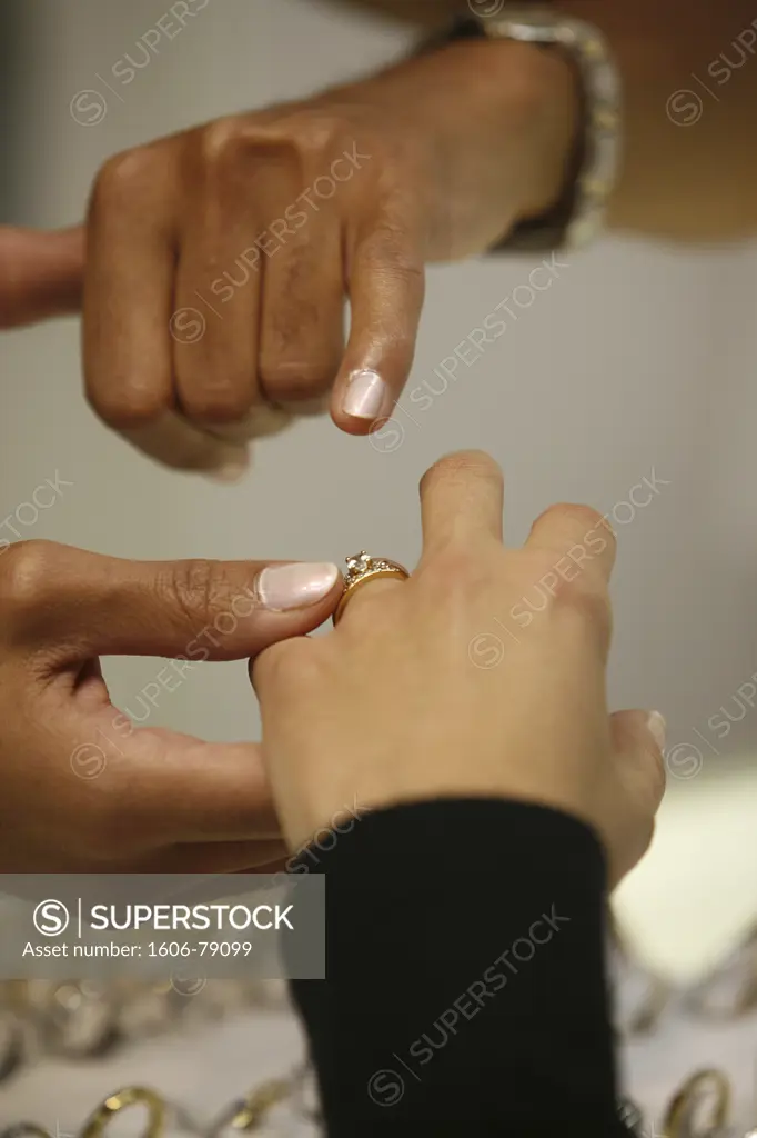 France, Paris, Paris, Couple choosing a wedding ring
