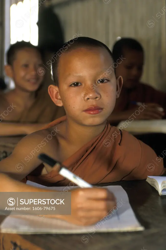 Laos, Luang Prabang, Monks in school. Luang Prabang