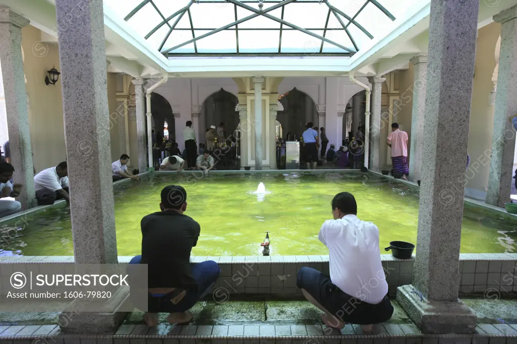 Malaysia, Penang, Penang, Wash before prayer.  Kapitan Kling mosque