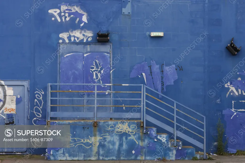 France, blue facade with tags