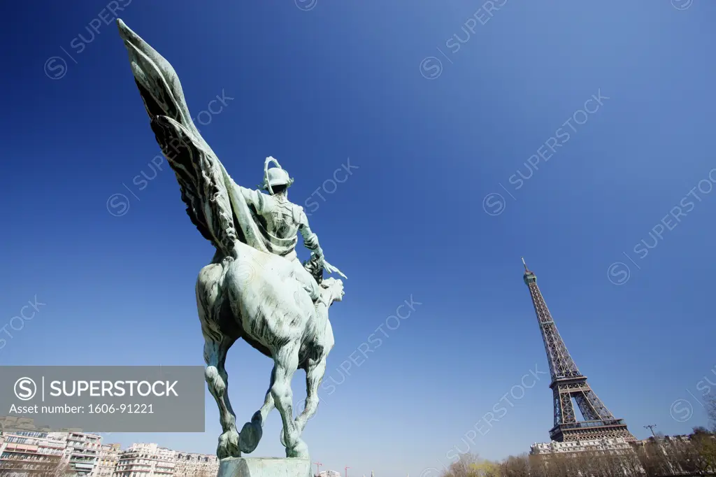 France, Paris, 7th arrondissement, Eiffel Tower, sculpture by Holger Wederkinch (1886-1959) int he foreground