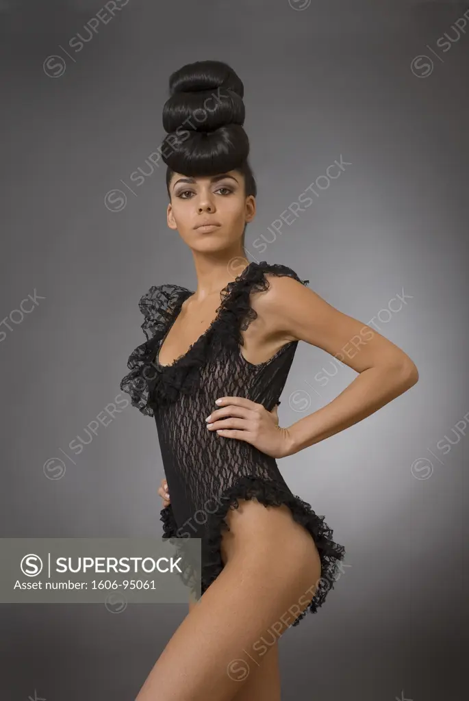 Woman wearing a lacy black body