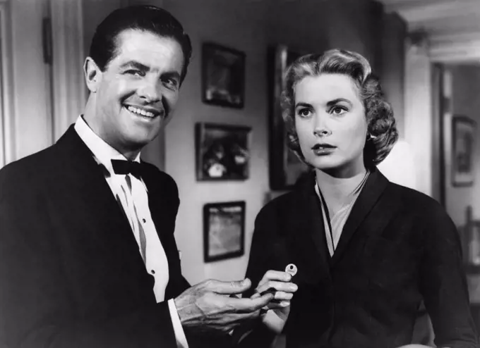 Robert Cummings and Grace Kelly , Dial M for Murder , 1954 directed by Alfred Hitchcock Warner Bros. Pictures