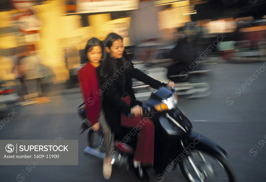 Girls on motorbike, Hanoi, Vietnam