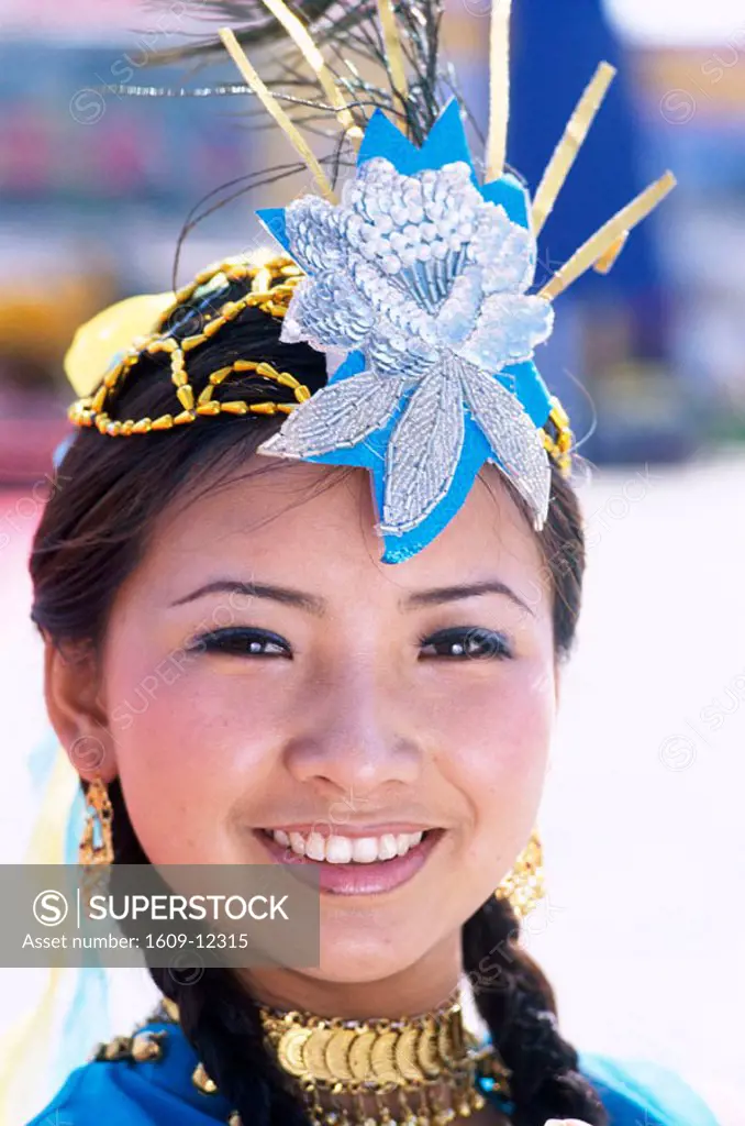 Uigur Minority / Woman Dressed in Uigur Costume, Urumqi, Xinjiang Province, China