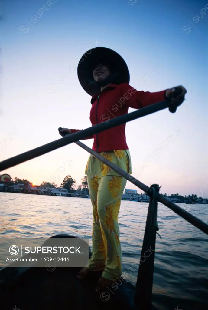 Boat Woman on Mekong River / Sunrise, Cantho, Mekong Delta, Vietnam