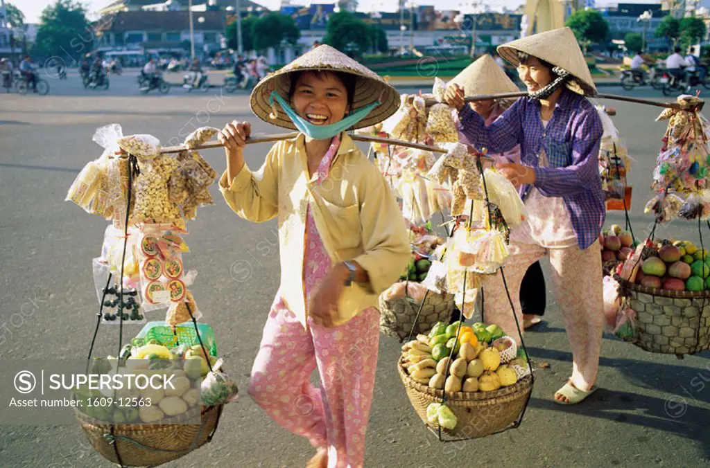 Female / Women Vendors Carrying Produce to Market, Ho Chi Minh City (Saigon), Vietnam
