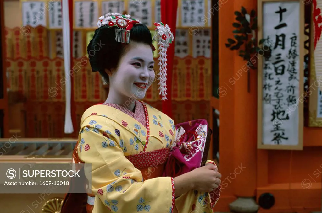 Apprentice Geisha (Maiko) / Woman Dressed in Traditional Costume / Kimono, Kyoto, Honshu, Japan