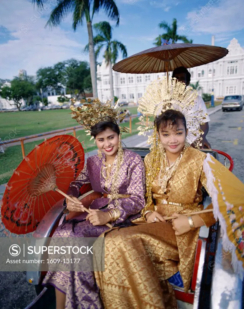 Women Dressed in Traditional Malay Costume in Trishaw, Penang, Malaysia